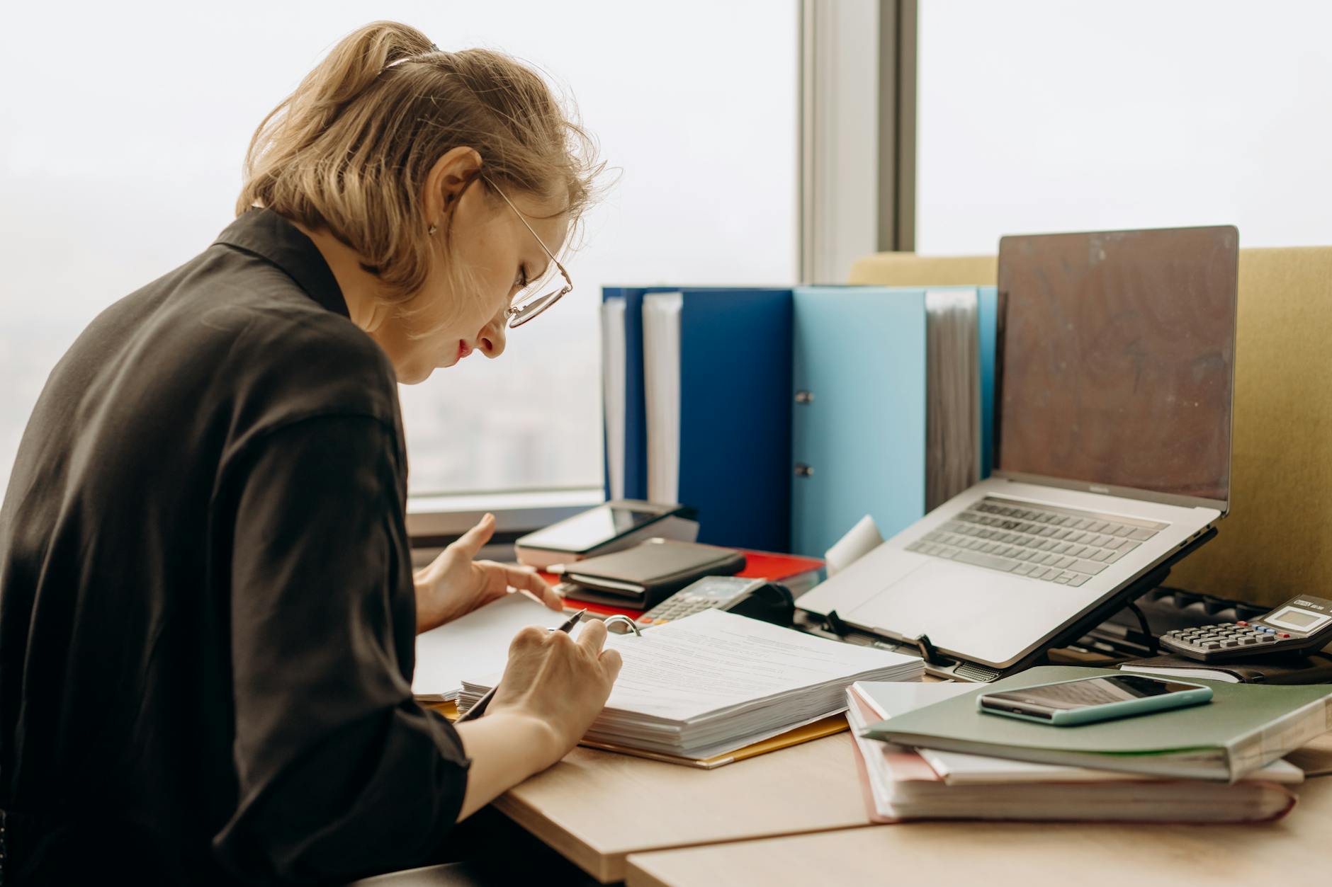 Working professional studying at a desk in Malaysia